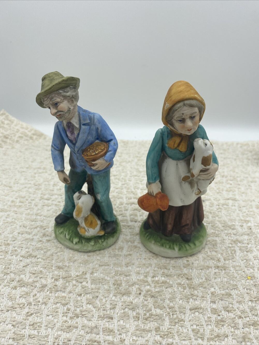 2-Vtg Enesco Porcelain Figurines, 1975 3-D Elderly Couple, With Puppies